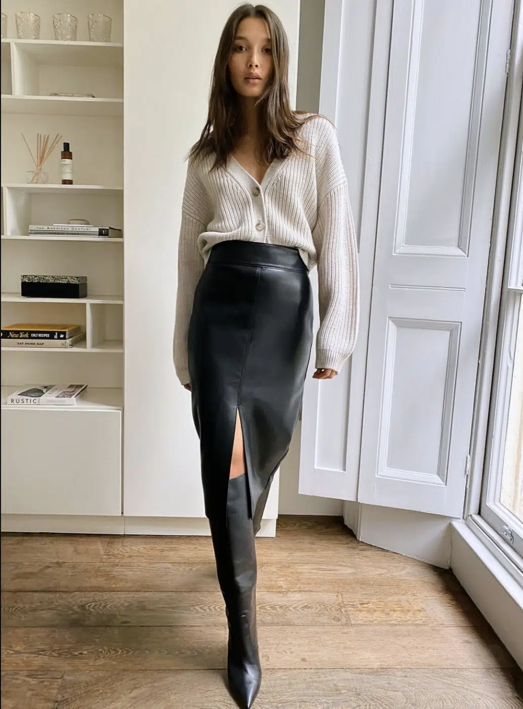 Leather tube skirt with boots outfit