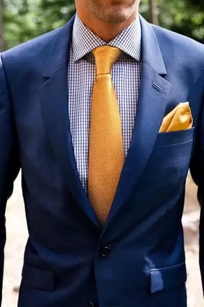 suite with contrast tie