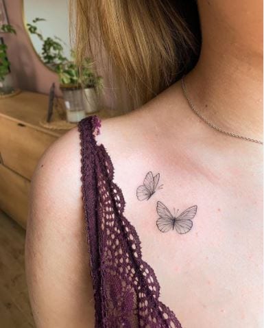 Collarbone Butterfly tattoo women at theYoucom