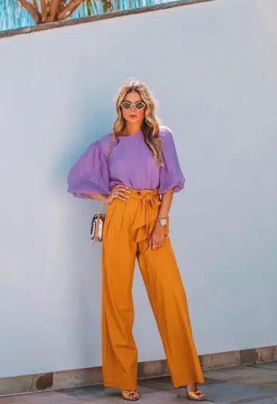 Orange pants with lilac shirt