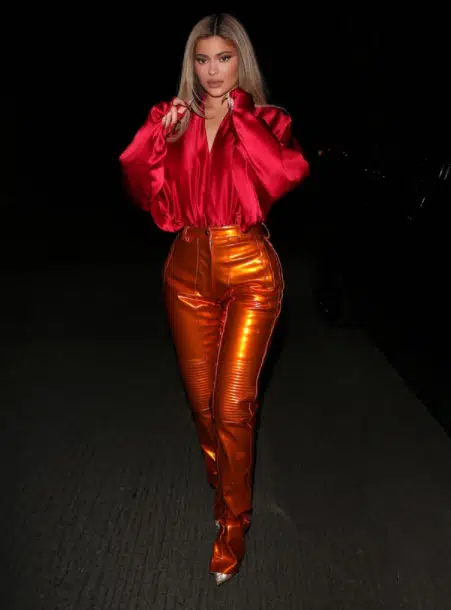 Orange pants with red top