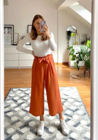 Orange pants with white shirt