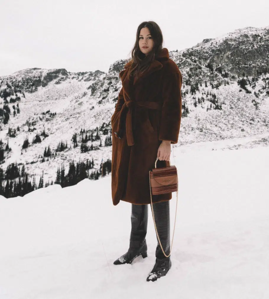 Big fuzzy brown coat ski trip outfit