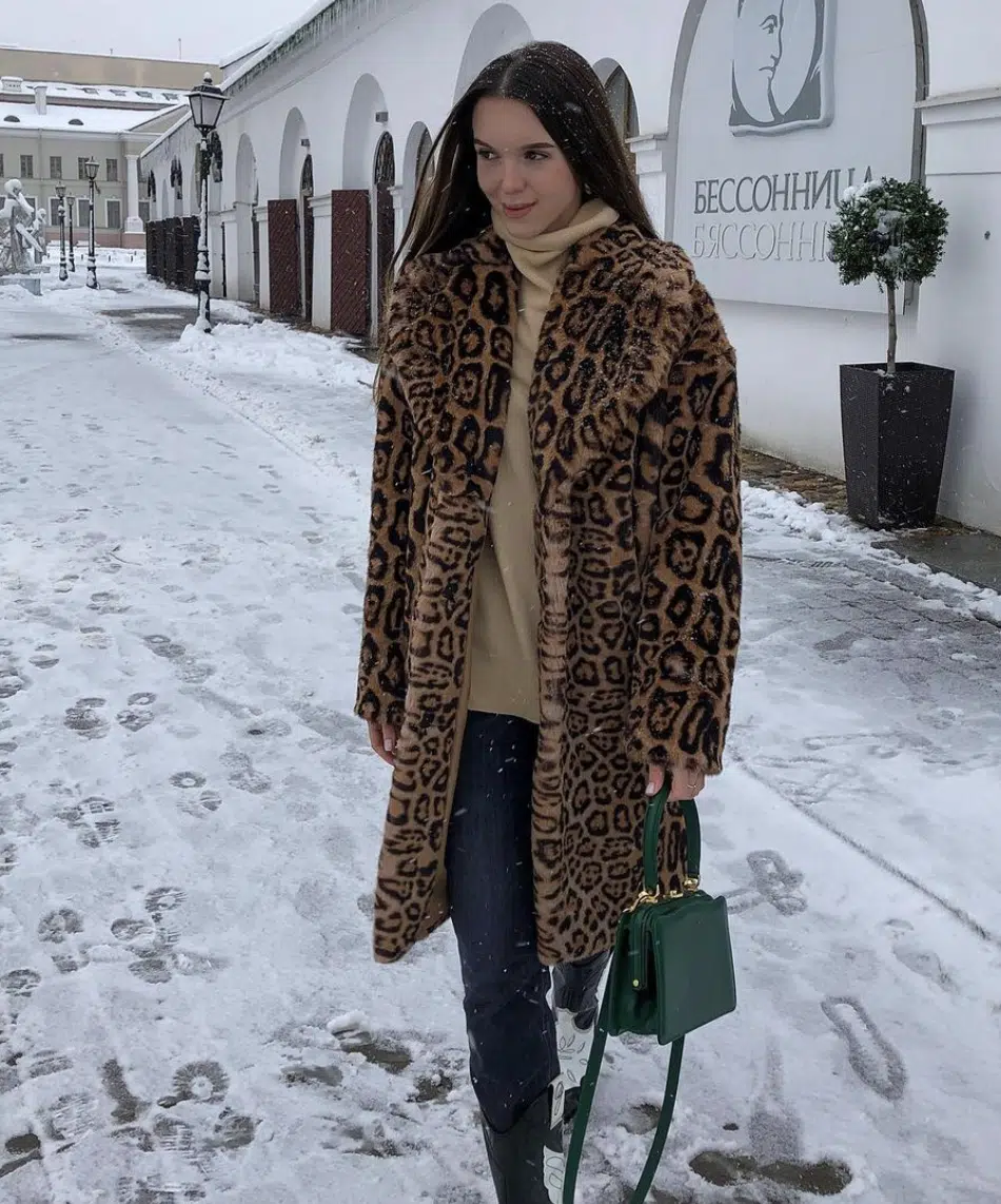 animal print jacket ski trip outfit