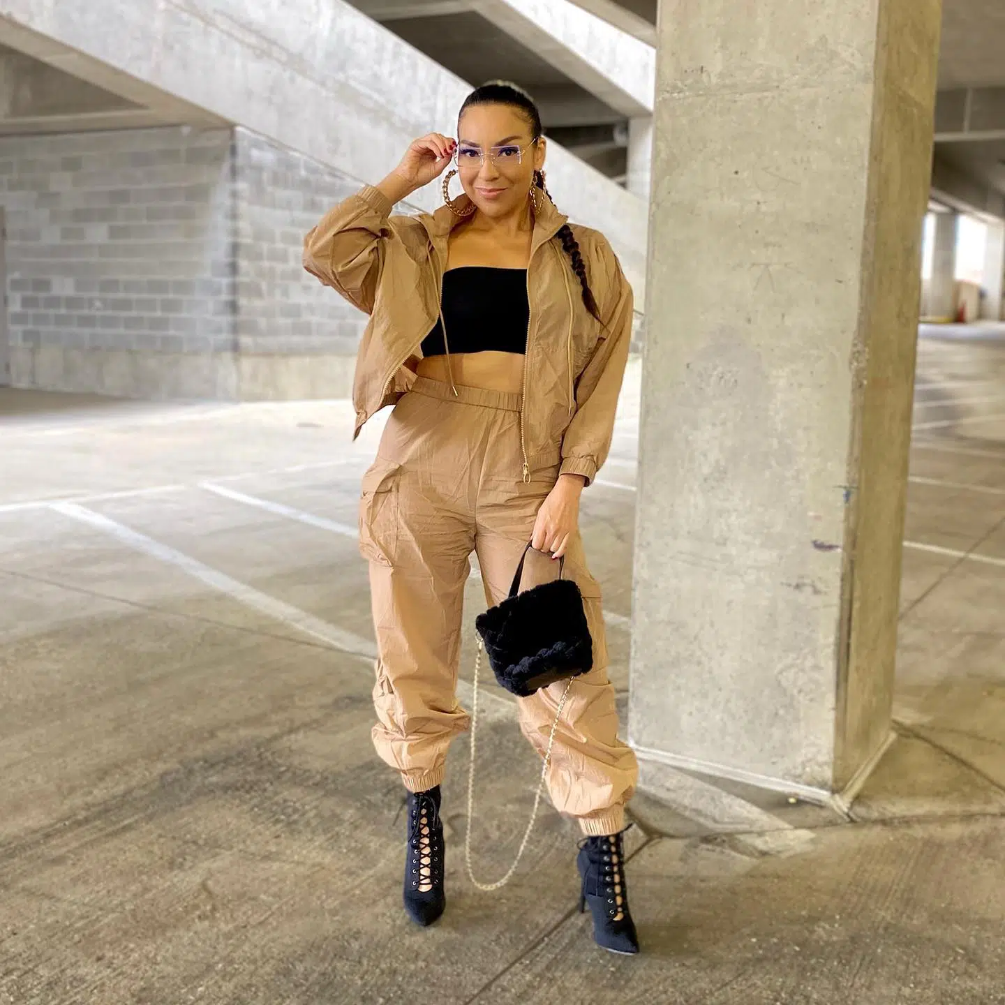 All beige cropped windbreaker and nylon pants