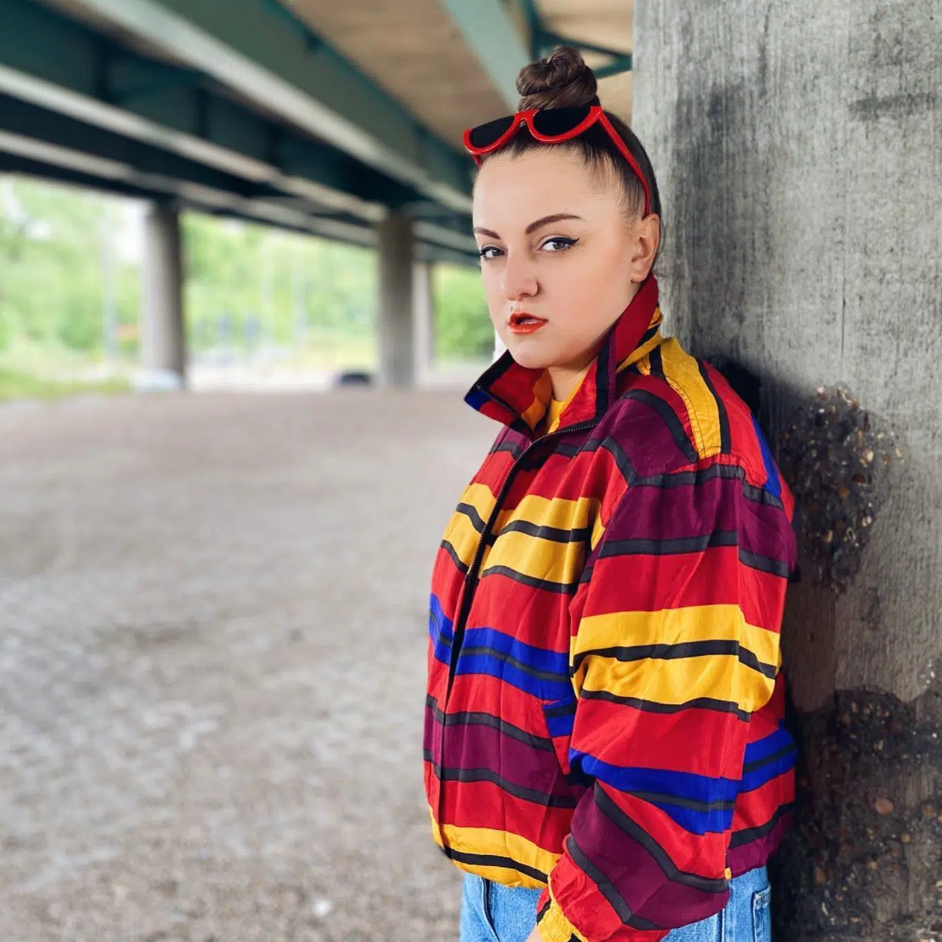 Red windbreaker with red glasses