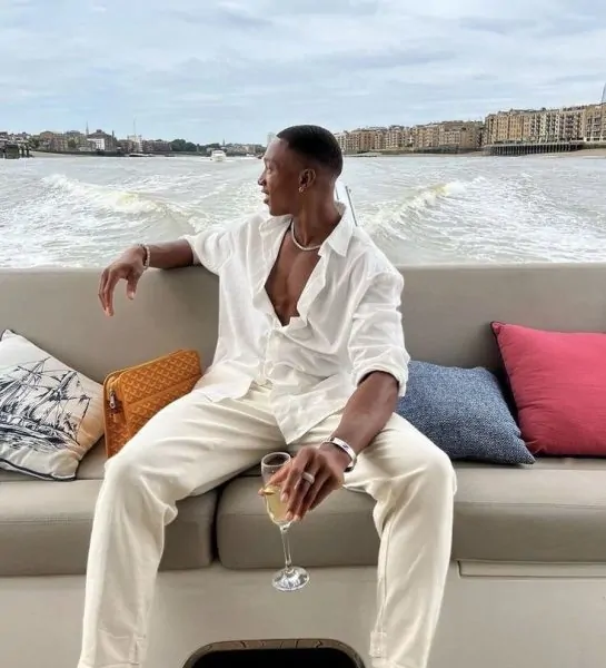 white man on yacht